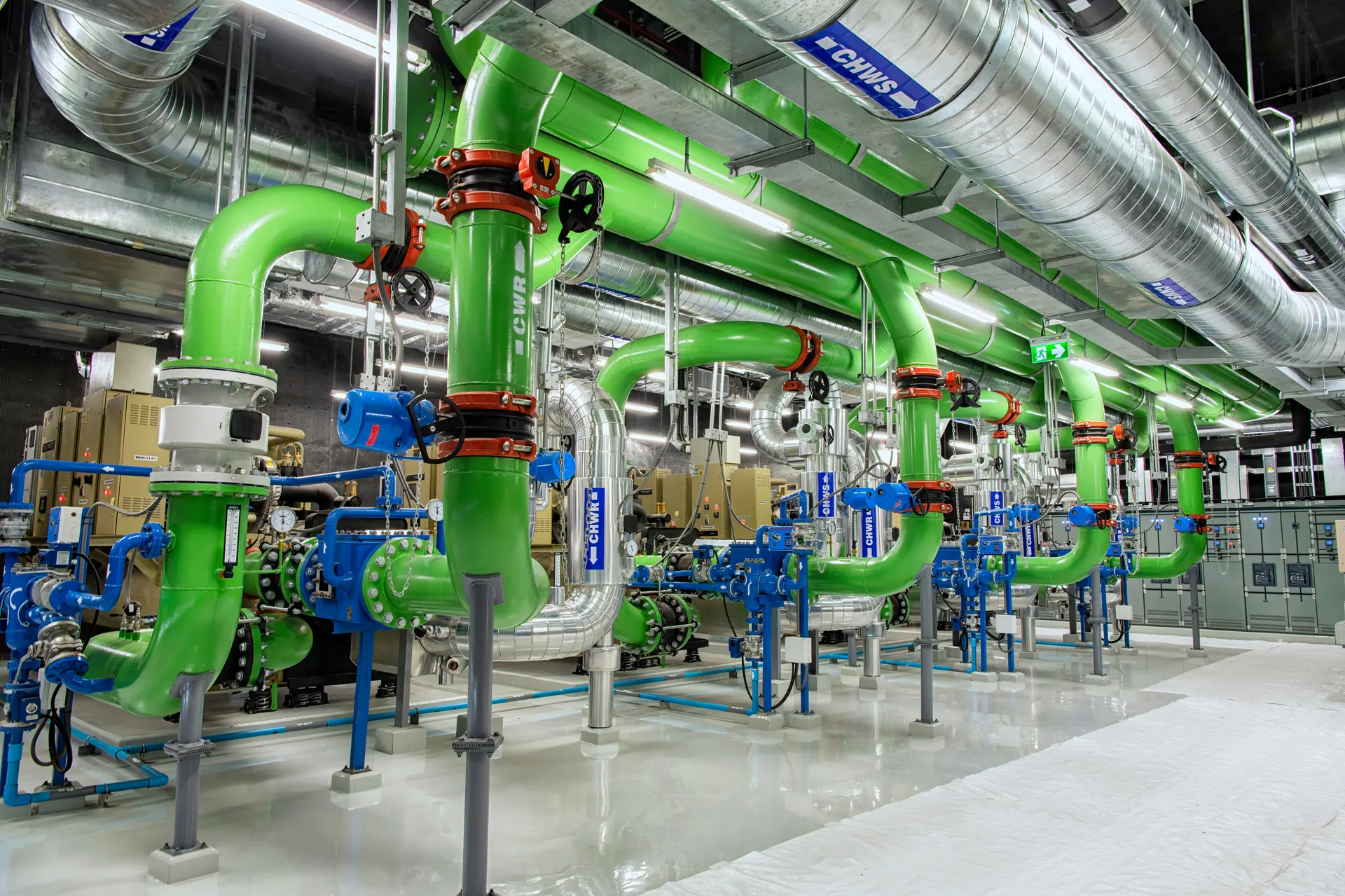 Rooftop utility water plant with cooling towers and pumps